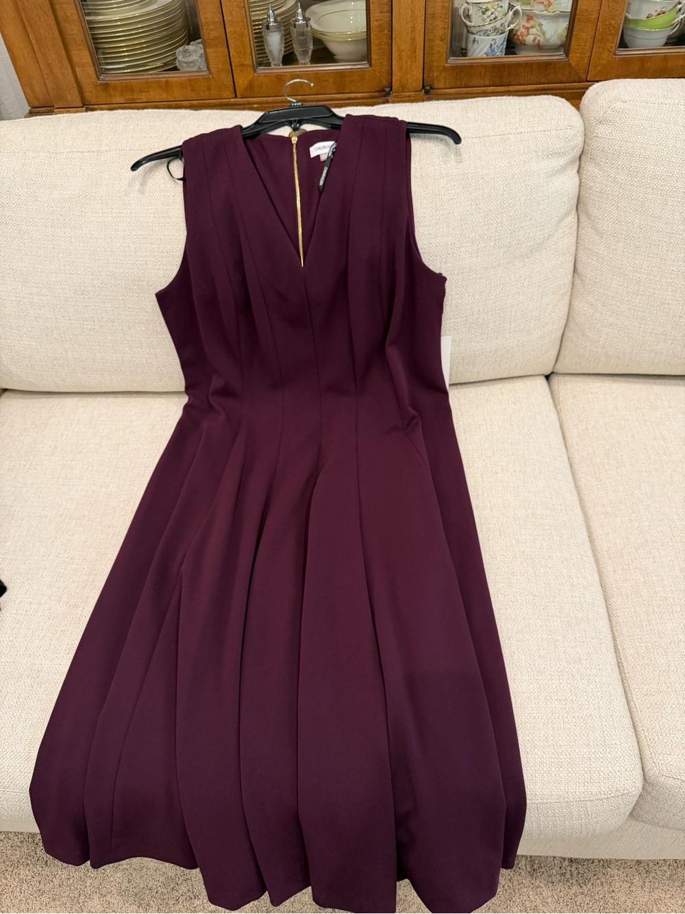 Calvin Klein Sleeveless V-Neck Pleated Midi Dress in Plum